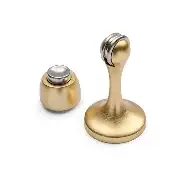 Magnetic doorstop in Polished brass